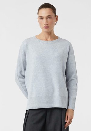 - Sweter