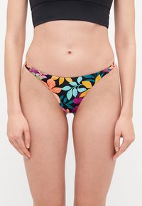 Bikini bottom featuring a black base with colorful floral and leaf patterns in orange, pink, teal, and purple. Low-rise design with thin sides.