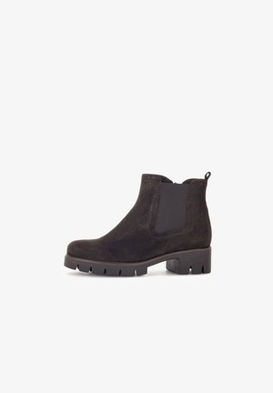 Black suede ankle boots with elastic side panels and a pull tab. Chunky rubber outsole with a tread design for traction.