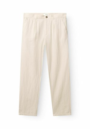 Beežid sirge lõikega püksid küljetaskute, vööaasade, nööpsulgemise ja vöökohal nähtava brändisildiga.