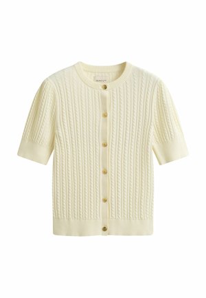 Crèmewitte korte mouw gebreide cardigan met kabelpatroon, ronde halslijn, geribbelde manchetten en zoom, en zes gouden knopen aan de voorkant.