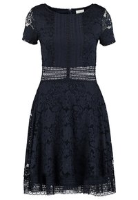 Robe courte en dentelle bleu marine à manches courtes, motif floral, taille ajustée, encolure ronde et jupe à hauteur du genou.