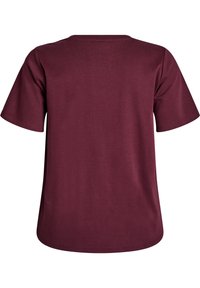 T-shirt bordeaux à manches courtes avec un col rond. Fabriqué en coton doux, il présente une coupe décontractée et une texture lisse sans motifs visibles.