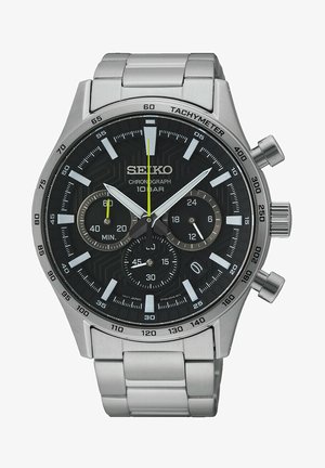 Montre chronographe en acier inoxydable argenté avec un cadran noir à motif, aiguilles lumineuses, trois sous-cadrans et marquages tachymétriques.