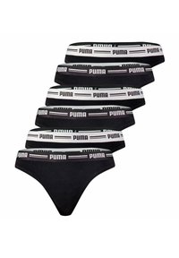 Schwarze Bikini-Brief mit einem weißen Puma-Logo auf dem elastischen Bund. Weicher Stoff, minimalistisches Design und eine elegante, niedrige Schnittform.