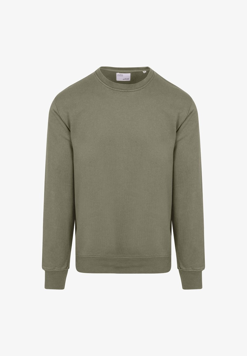 Felpa verde oliva con texture a coste, scollatura a girocollo, maniche lunghe e polsini e orlo a coste. Design semplice e dalla vestibilità morbida.