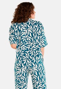 Pomm'poire NANAYA - Haut de pyjama - bleu