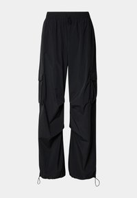 Black cargo pants with an elastic waistband, drawstring closure, and multiple side pockets. Made from lightweight fabric with a loose fit.