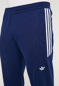 adidas Originals Teplákové kalhoty - dark blue
