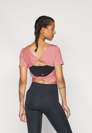 Nike Performance ONE CLASSIC - Sport T-Shirt - canyon pink/black