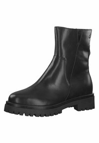 Bottine en cuir noir avec une finition lisse, des panneaux latéraux élastiques et une semelle en caoutchouc texturée et épaisse. Un design à la fois élégant et fonctionnel.