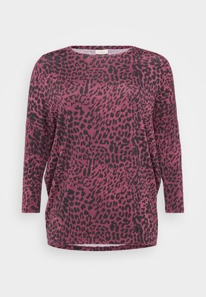 Leoparda raksta tops tumši rozā un melnā krāsā. Brīva piegriezuma ar garām piedurknēm un apaļu kakla izgriezumu. Mīksta auduma ar gludu tekstūru.