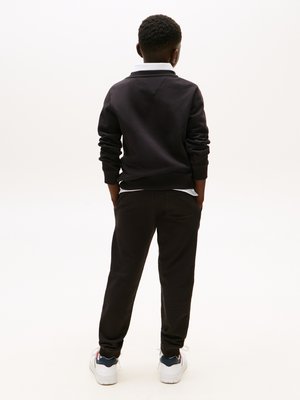 ESSENTIAL UNISEX - Pantaloni sportivi - black