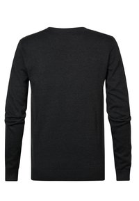 Black long-sleeve sweater with a crew neckline. Made from a smooth, knitted fabric. Features ribbed cuffs and hem.