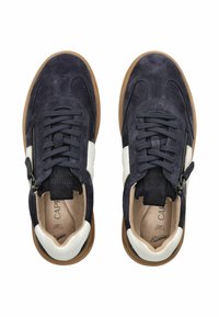 Navy suede sneakers with white leather accents, round toe, lace-up and zipper closure, gum rubber soles, and textured fabric detailing.