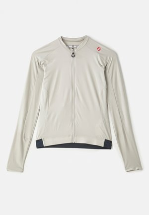 Langærmet cykeljakke i lys grå med lynlås foran, tekstureret stof og mørkeblå detaljer ved kanten og ærmerne.