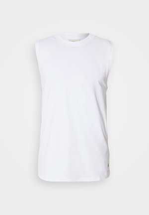 Witte, mouwloze katoenen tanktop met een ronde halslijn en een subtiel geweven label op de zoom. Soepele textuur, losse pasvorm en eenvoudig ontwerp.