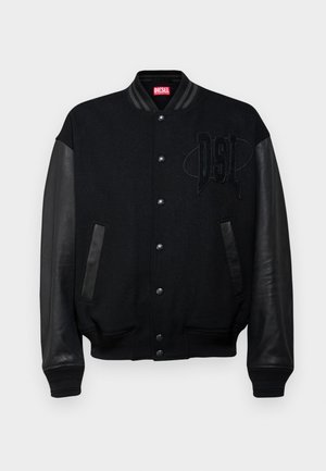 Veste varsity noire avec un corps en laine, des manches en cuir, des boutons-pression à l'avant et une broderie "DSL" sur la poitrine. Poignets et ourlet côtelés.