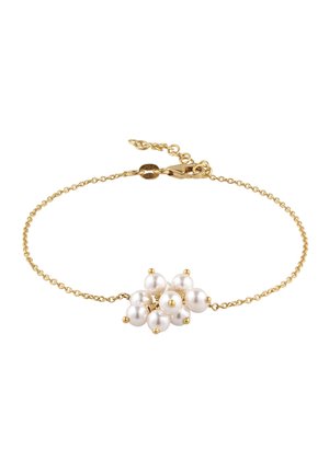 Delikat guldkædearmbånd med en klynge af syv hvide perler i midten og justerbar lukning.