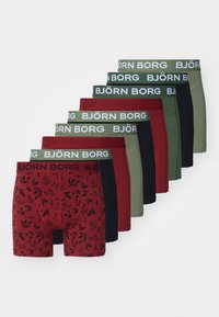 Set of nine men's boxer shorts featuring varied colors: red, green, black; one pair has a floral pattern. All with "BJÖRN BORG" waistband.