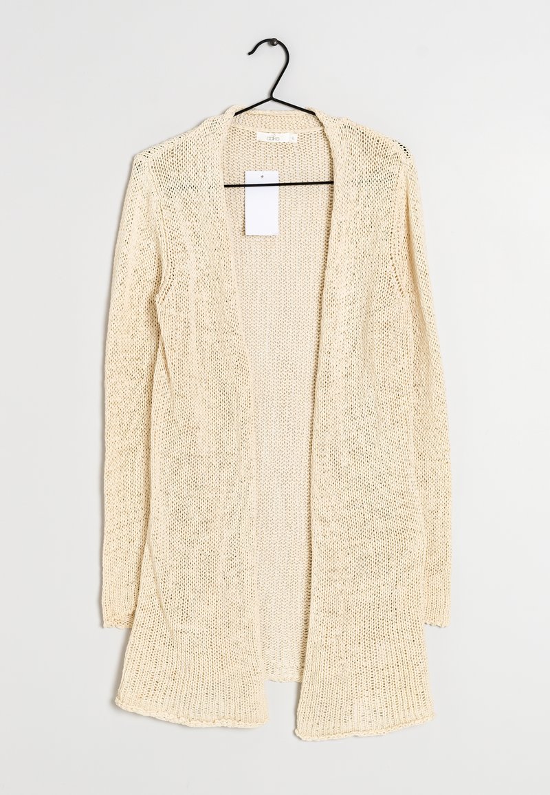 Cardigan léger à l'avant ouvert en tricot beige crème, avec des manches longues, une texture respirante et un ourlet fluide.