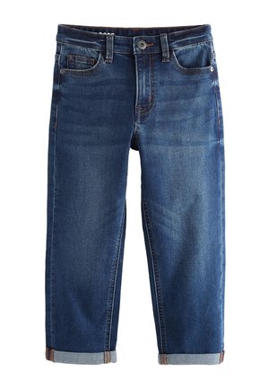 Jean en denim bleu avec revers roulés, bouton et fermeture éclair à l'avant, et style à cinq poches.