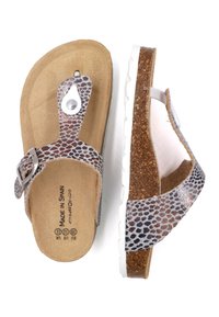 Sandales marron et argent au motif reptile avec un semelle en liège, boucle ajustable en argent et semelle en caoutchouc blanc. Fabriquées en Espagne.