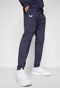 Castore SCUBA JOGGERS - Tracksuit bottoms - midnight navy