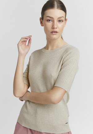 Top corto a maniche corte in maglia a coste color beige con scollatura rotonda. Presenta una silhouette aderente e una texture delicata. Etichetta logo piccola sull'orlo.