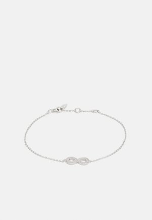 Zilveren armband met een infinity-symbool als middelpunt, voorzien van een delicate ketting en een sluiting. Het symbool is versierd met kleine edelstenen.