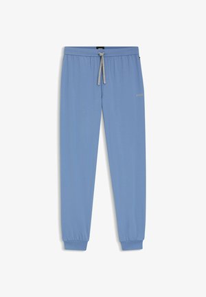 Jasnoniebieskie spodnie dresowe z elastyczną talią, regulowanym sznurkiem i zwężanymi mankietami; charakteryzują się subtelnym logo z przodu.