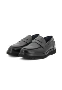 Mocassini in pelle nera con finitura liscia, caratterizzati da dettagli cuciti e un colletto imbottito. Design slip-on con suola in gomma per il comfort.