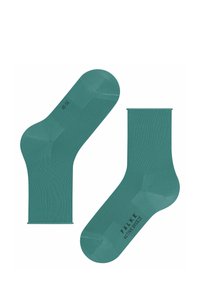 Chaussettes de couleur bleu-vert présentant une texture lisse et respirante. Conçues avec une longueur standard et un motif de côtes léger. Étiquette de la marque visible.