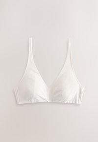 Soutien-gorge blanc à bonnets souples avec fines bretelles, bonnets triangulaires et sans armatures visibles, présenté sur un fond neutre.