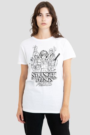 Young woman wearing a white T-shirt featuring black line art of Stranger Things characters and the text "Tales from 85."
