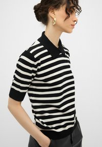 adL Printtipaita - striped black