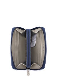 Blue zippered wallet with a textured exterior, beige interior, multiple card slots, and a tag labeled "VUCH EST. 2015."