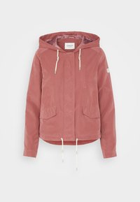 Rosa Cordjacke mit Kapuze, ausgestattet mit einem Reißverschluss, zwei Vordertaschen und einem Tunnelzug am Bund. Verziert mit einem Logo-Patch am Ärmel.