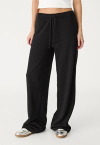 Stradivarius WIDE JOGGER - Pantalon de survêtement - black