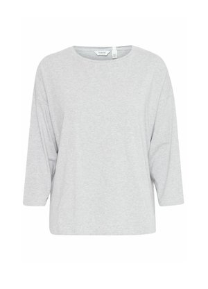 Ljusgrå oversized T-shirt i mjuk bomull, med rund halsringning och trekvartslånga ärmar, med en slät yta.