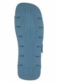Suola di scarpa in gomma blu con superficie texturizzata, caratterizzata da scanalature orizzontali e verticali, e un design di insetto mosca al centro.