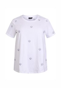 White cotton t-shirt with short sleeves, featuring scattered navy blue seashell prints. Round neckline and relaxed fit design.