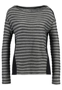 T-shirt à manches longues rayé en gris et noir. Doté d'un tissu texturé avec des fils métalliques, d'un col rond et de panneaux latéraux.