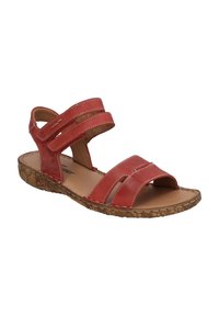 Red leather sandals with two wide adjustable straps, open toe design, and a textured brown rubber sole. Stitching accents are visible.