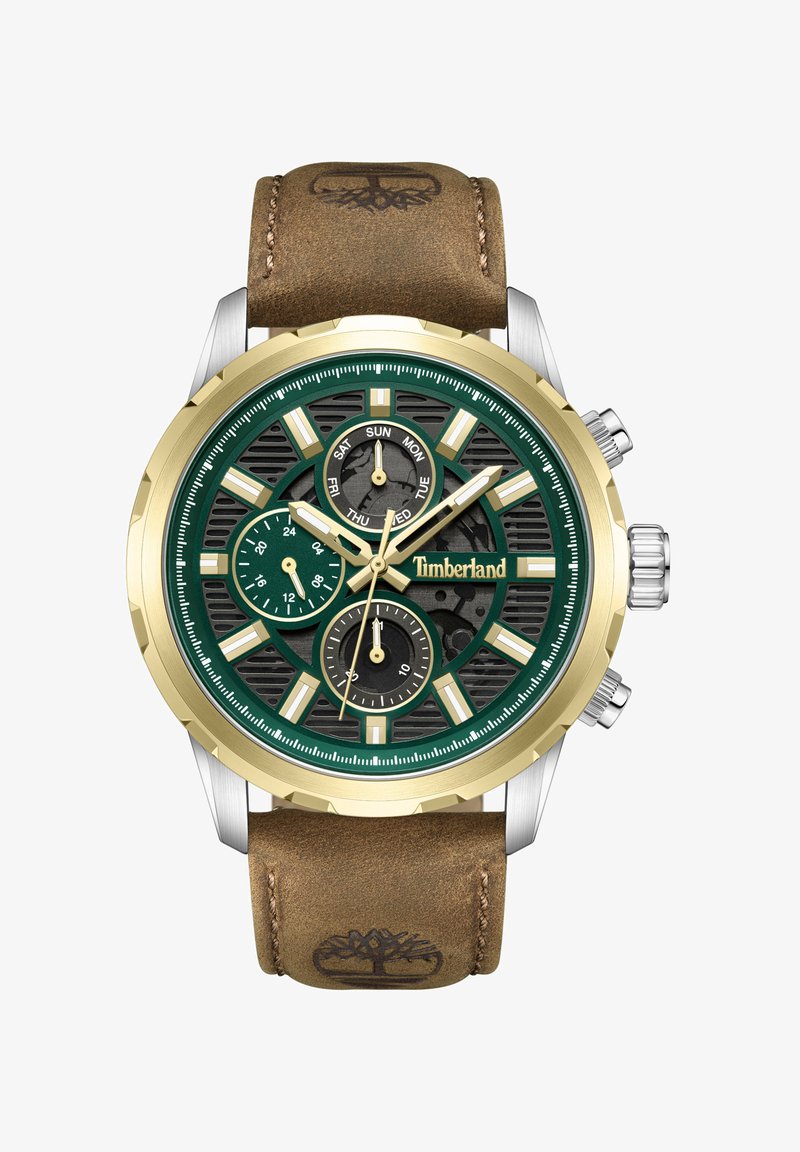Grön och guld kronografklocka med en svart mönstrad urtavla, läderarmband och Timberland-logotyp. Har indikatorer för dag och datum.