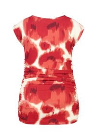 Rood en wit gebloemd top met een gestructureerde afwerking, met korte mouwen en geplooide zijkanten. Rondde halslijn en een losse pasvorm.