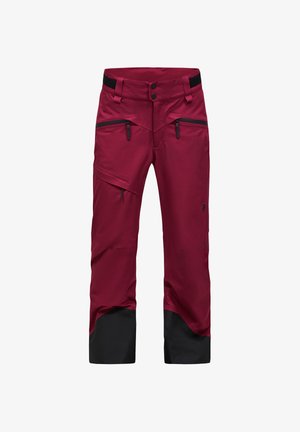 Bordeauxrode waterdichte skibroek met zwarte onderbenen. Voorzien van ritszakken, verstelbare tailleband en een gladde textuur.