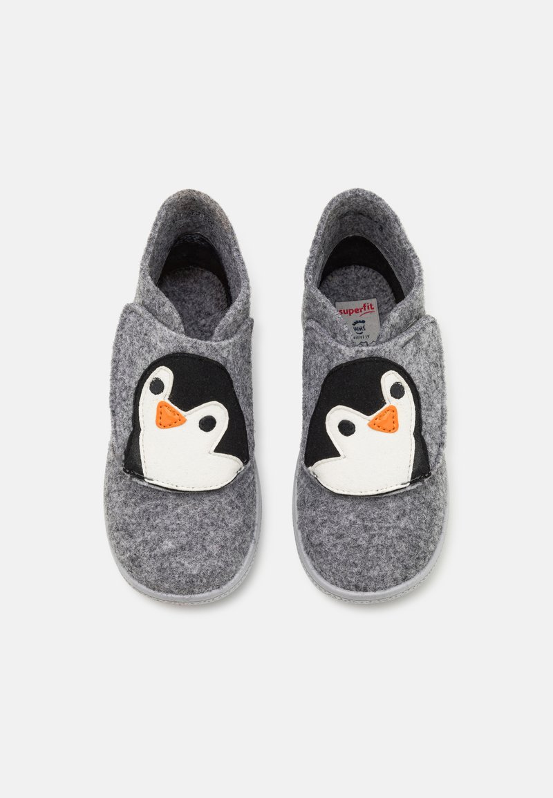 Gray felt slippers featuring a penguin design with a black and white face and orange beak. Slip-on style with soft, textured material.