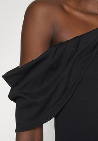 Iro Triko s potiskem - black