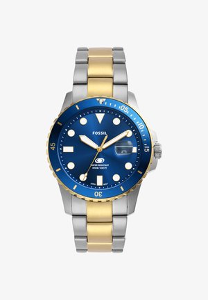 Heren polshorloge in twee tinten zilver en goud roestvrij staal met blauwe wijzerplaat, luminieuze markers, datumvenster en draaibare lunette, waterbestendig tot 100 m.